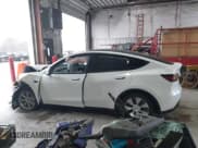 ✅ 2023 Tesla Model Y Long Range • VIN: 7SAYGAEEXPF789037 • Lot: 41551605. Listed on IAAI with 8,630 mi. Free auction sales archive from the USA and detailed vehicle history report at DreamBid. Image 14.