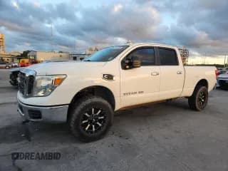 ✅ 2017 Nissan Titan SV • VIN: 1N6BA1F37HN507857 • Lot: 90673695. Wystawiony na Copart z przebiegiem 153 730 mil. Bezpłatny archiwum sprzedaży aukcyjnych z USA i szczegółowy raport historii pojazdu na DreamBid. Zdjęcie 1.