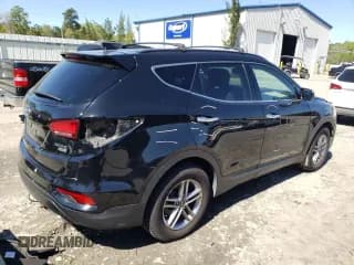 ✅ 2017 Hyundai Santa Fe 2.4L • VIN: 5NMZUDLB9HH016693 • Лот: 44305503. Опубликован ранее на Copart с пробегом 103 611 миль. Бесплатный доступ к архиву аукционных продаж из США и подробный отчёт об истории автомобиля на DreamBid. Изображение 3.