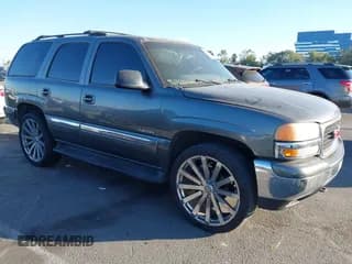 ✅ 2001 GMC Yukon SLE • VIN: 1GKEC13T91J144168 • Lot: 43567088. Listed on IAAI with 240,259 mi. Free auction sales archive from the USA and detailed vehicle history report at DreamBid. Image 1.