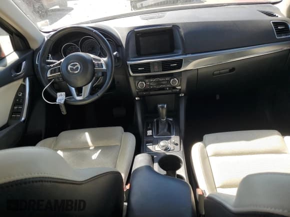 ✅ 2016 Mazda CX-5 Grand Touring • VIN: JM3KE4DY2G0676811 • Lot: 85204805. Wystawiony na Copart z przebiegiem 116 610 mil. Bezpłatny archiwum sprzedaży aukcyjnych z USA i szczegółowy raport historii pojazdu na DreamBid. Zdjęcie 8.
