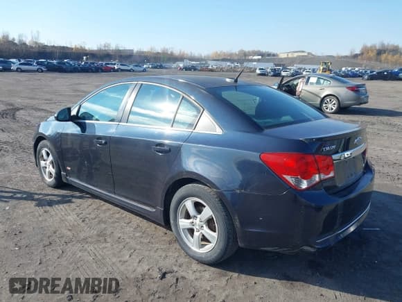 ✅ 2014 Chevrolet Cruze 1LT • VIN: 1G1PC5SB3E7363823 • Lot: 43610493. Listed on IAAI with 185,881 mi. Free auction sales archive from the USA and detailed vehicle history report at DreamBid. Image 3.