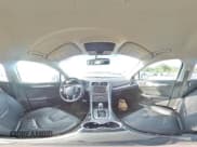 ✅ 2016 Ford Fusion Titanium • VIN: 3FA6P0K95GR135489 • Lot: 71360435. Listed on Copart with 129,848 mi. Free auction sales archive from the USA and detailed vehicle history report at DreamBid. Image 14.