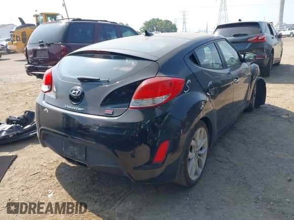 2014 Hyundai Veloster with VIN KMHTC6AD2EU214301, listed as a IAAI auction lot 43016517 with 122,845 mi miles and . Bid and sale history available at DreamBid. Image 4.