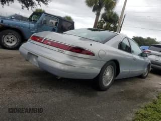 ✅ 1994 Lincoln Mark VIII • VIN: 1LNLM91V3RY729054 • Lot: 74940184. Listed on Copart with 83,467 mi. Free auction sales archive from the USA and detailed vehicle history report at DreamBid. Image 3.