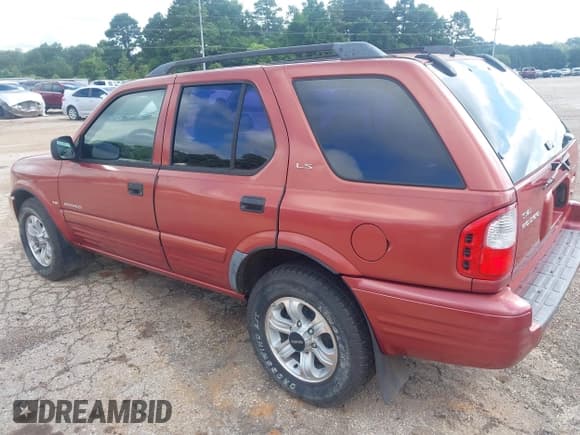 ✅ 2000 Isuzu Rodeo S • VIN: 4S2CK58W5Y4328388 • Lot: 42531403. Listed on IAAI with 238,614 mi. Free auction sales archive from the USA and detailed vehicle history report at DreamBid. Image 3.