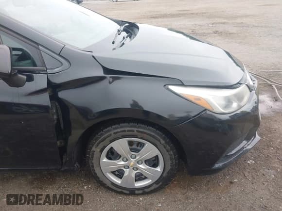 ✅ 2018 Chevrolet Cruze LS • VIN: 1G1BB5SM4J7116996 • Lot: 43534133. Listed on IAAI with 204,194 mi. Free auction sales archive from the USA and detailed vehicle history report at DreamBid. Image 17.