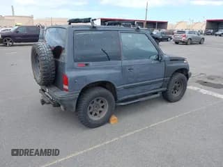 ✅ 1995 Geo Tracker • VIN: 2CNBJ1866S6903070 • Лот: 42756444. Опубликован ранее на IAAI с пробегом 99 427 миль. Бесплатный доступ к архиву аукционных продаж из США и подробный отчёт об истории автомобиля на DreamBid. Изображение 4.