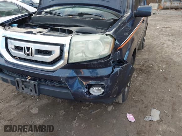 ✅ 2011 Honda Pilot Touring • VIN: 5FNYF4H91BB058733 • Lot: 43765223. Listed on IAAI with 219,502 mi. Free auction sales archive from the USA and detailed vehicle history report at DreamBid. Image 6.