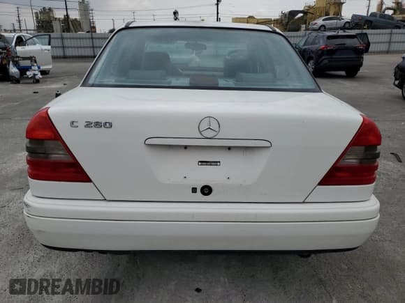 ✅ 1997 Mercedes-Benz C 230/260/280/320 • VIN: WDBHA28E3VF582237 • Lot: 76826534. Wystawiony na Copart z przebiegiem 240 702 mil. Bezpłatny archiwum sprzedaży aukcyjnych z USA i szczegółowy raport historii pojazdu na DreamBid. Zdjęcie 6.