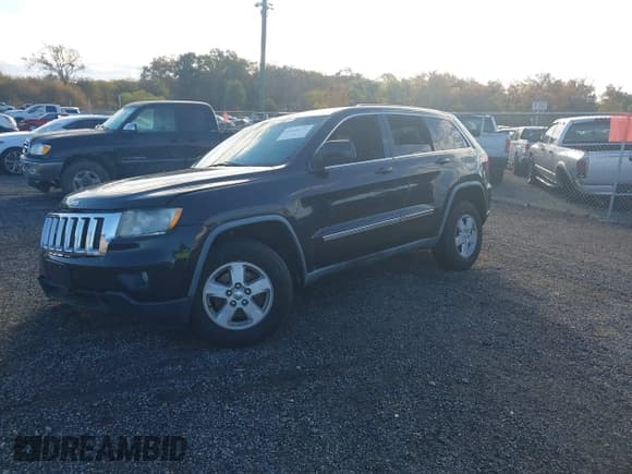 ✅ 2012 Jeep Grand Cherokee Laredo • VIN: 1C4RJFAG7CC184164 • Lot: 43499110. Listed on IAAI with 118,668 mi. Free auction sales archive from the USA and detailed vehicle history report at DreamBid. Image 2.