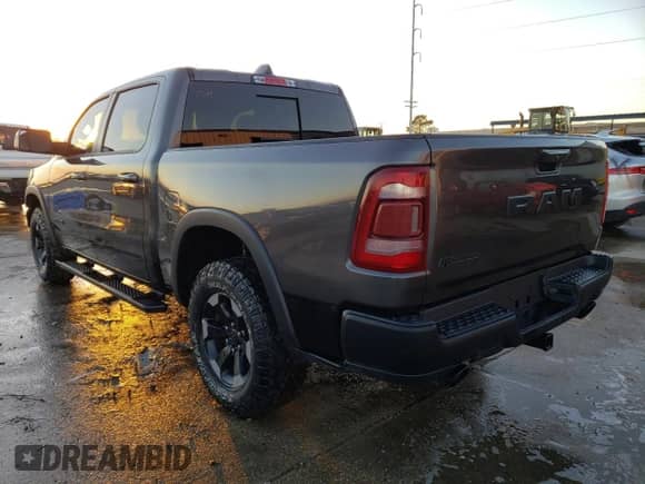 2020 Ram 1500 Rebel z VIN 1C6RRELT9LN303468, wystawiony jako Copart lot #71399722 z przebiegiem 18 822 mil mil oraz . Historia ofert i sprzedaży dostępna na DreamBid. Obrazek 3.