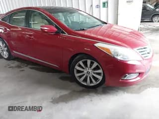 ✅ 2013 Hyundai Azera • VIN: KMHFH4JGXDA297716 • Лот: 42969476. Опубликован ранее на IAAI с пробегом 146 384 миль. Бесплатный доступ к архиву аукционных продаж из США и подробный отчёт об истории автомобиля на DreamBid. Изображение 1.