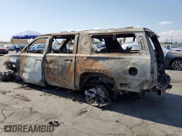 2016 Chevrolet Suburban LT with VIN 1GNSCHKC2GR279258, listed as a Copart auction lot 65976524 with Not provided miles and Non repairable. Bid and sale history available at DreamBid. Image 2.