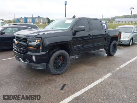 2017 Chevrolet Silverado 1500 LT with VIN 3GCUKREC7HG168132, listed as a IAAI auction lot 43272093 with 130,253 mi miles and . Bid and sale history available at DreamBid. Image 2.