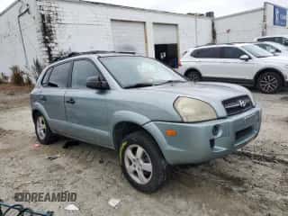 2005 Hyundai Tucson GL z VIN KM8JM12B65U184708, wystawiony jako Copart lot #73351044 z przebiegiem 209 563 mil mil oraz Szkoda całkowita • Salvage title. Historia ofert i sprzedaży dostępna na DreamBid. Obrazek 4.