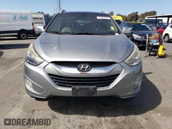 2015 Hyundai Tucson SE z VIN KM8JU3AG7FU098981, wystawiony jako Copart lot #71804224 z przebiegiem 179 496 mil mil oraz Czysty tytuł • Clean title. Historia ofert i sprzedaży dostępna na DreamBid. Obrazek 5.