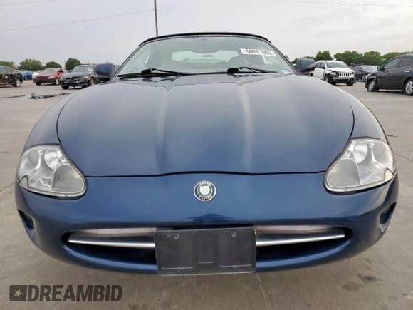 ✅ 1997 Jaguar XK • VIN: SAJGX2740VC005415 • Lot: 56801065. Listed on Copart with 67,770 mi. Free auction sales archive from the USA and detailed vehicle history report at DreamBid. Image 5.