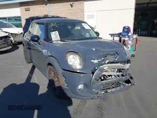 2017 MINI Hardtop Cooper S with VIN WMWXP7C57H2A45351, listed as a IAAI auction lot 41057859 with 144,006 mi miles and . Bid and sale history available at DreamBid. Image 1.