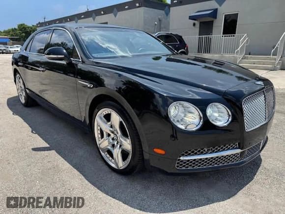 ✅ 2015 Bentley Flying Spur • VIN: SCBEC9ZA4FC041772 • Лот: 70284495. Опубликован ранее на Copart с пробегом 51 386 миль. Бесплатный доступ к архиву аукционных продаж из США и подробный отчёт об истории автомобиля на DreamBid. Изображение 4.
