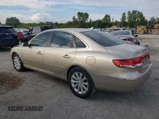 2009 Hyundai Azera GLS z VIN KMHFC46D09A360665, wystawiony jako Copart lot #71665544 z przebiegiem 143 711 mil mil oraz Szkoda całkowita • Salvage title. Historia ofert i sprzedaży dostępna na DreamBid. Obrazek 2.