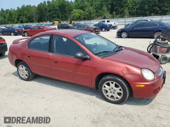 2003 Dodge Neon SXT z VIN 1B3ES56C23D142816, wystawiony jako Copart lot #59310955 z przebiegiem 98 480 mil mil oraz Czysty tytuł • Clean title. Historia ofert i sprzedaży dostępna na DreamBid. Obrazek 5.