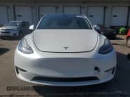 ✅ 2021 Tesla Model Y Standard Range • VIN: 5YJYGDED9MF163299 • Lot: 80437915. Wystawiony na Copart z przebiegiem 79 790 mil. Bezpłatny archiwum sprzedaży aukcyjnych z USA i szczegółowy raport historii pojazdu na DreamBid. Zdjęcie 5.