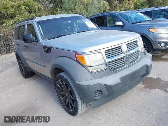 ✅ 2007 Dodge Nitro SXT • VIN: 1D8GU28K17W739262 • Lot: 43700502. Listed on IAAI with 236,413 mi. Free auction sales archive from the USA and detailed vehicle history report at DreamBid. Image 1.