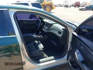 2016 Chevrolet Impala LT z VIN 2G1115S31G9143313, wystawiony jako IAAI lot #43204588 z przebiegiem 139 806 mil mil oraz . Historia ofert i sprzedaży dostępna na DreamBid. Obrazek 5.