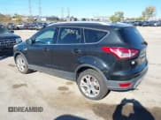 ✅ 2014 Ford Escape Titanium • VIN: 1FMCU9J93EUA67819 • Lot: 43595851. Wystawiony na IAAI z przebiegiem 165 622 mil. Bezpłatny archiwum sprzedaży aukcyjnych z USA i szczegółowy raport historii pojazdu na DreamBid. Zdjęcie 3.
