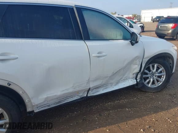 ✅ 2016 Mazda CX-9 Sport • VIN: JM3TCBBYXG0113183 • Lot: 43275398. Listed on IAAI with 67,799 mi. Free auction sales archive from the USA and detailed vehicle history report at DreamBid. Image 6.