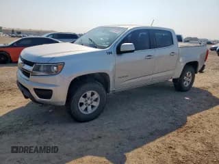 ✅ 2019 Chevrolet Colorado 2WD Work Truck • VIN: 1GCGSBEA6K1206409 • Лот: 69775035. Опубликован ранее на Copart с пробегом 145 401 миль. Бесплатный доступ к архиву аукционных продаж из США и подробный отчёт об истории автомобиля на DreamBid. Изображение 1.