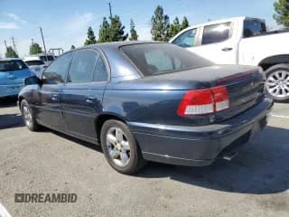 ✅ 2000 Cadillac Catera • VIN: W06VR54R2YR009874 • Lot: 80943625. Listed on Copart with 118,513 mi. Free auction sales archive from the USA and detailed vehicle history report at DreamBid. Image 2.