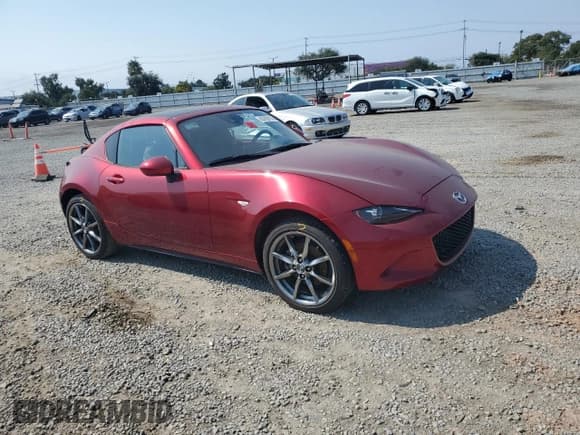✅ 2021 Mazda MX-5 Miata Grand Touring • VIN: JM1NDAM76M0454265 • Lot: 63705115. Listed on Copart with Not provided. Free auction sales archive from the USA and detailed vehicle history report at DreamBid. Image 4.