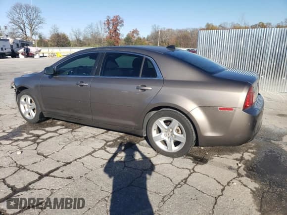 ✅ 2012 Chevrolet Malibu 1LS • VIN: 1G1ZB5E06CF280444 • Lot: 81334554. Listed on Copart with 175,529 mi. Free auction sales archive from the USA and detailed vehicle history report at DreamBid. Image 2.