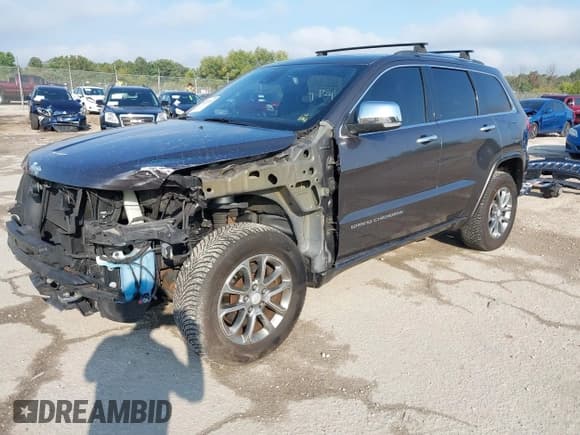 ✅ 2014 Jeep Grand Cherokee Overland • VIN: 1C4RJFCM0EC338798 • Lot: 43257111. Listed on IAAI with 177,271 mi. Free auction sales archive from the USA and detailed vehicle history report at DreamBid. Image 2.