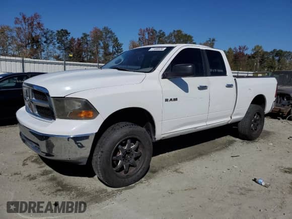 2010 Dodge 1500 ST with VIN 1D7RB1GP7AS154484, listed as a Copart auction lot 77488534 with 159,969 mi miles and Salvage title. Bid and sale history available at DreamBid. Image 1.