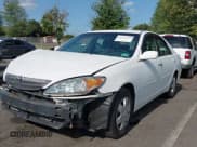 ✅ 2002 Toyota Camry LE • VIN: 4T1BE32K62U063797 • Lot: 43176367. Listed on IAAI with 209,320 mi. Free auction sales archive from the USA and detailed vehicle history report at DreamBid. Image 2.