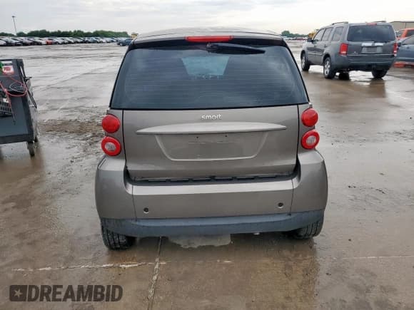 ✅ 2009 Smart fortwo Pure • VIN: WMEEJ31X49K233947 • Lot: 60535065. Listed on Copart with 48,669 mi. Free auction sales archive from the USA and detailed vehicle history report at DreamBid. Image 6.