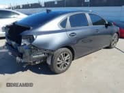 ✅ 2023 Kia Forte LXS • VIN: 3KPF24AD6PE652054 • Lot: 43551984. Listed on IAAI with 22,074 mi. Free auction sales archive from the USA and detailed vehicle history report at DreamBid. Image 4.