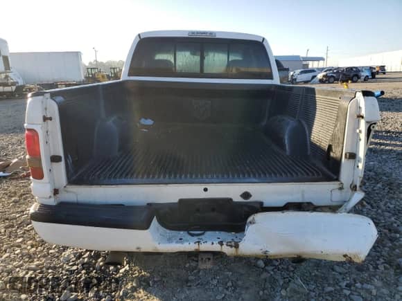 1999 Dodge 1500 с VIN 3B7HC13Z5XM562235, выставлен на аукционе Copart как лот 86053294 с пробегом 149 234 миль миль и Списание • Salvage title. История ставок и продаж доступна на DreamBid. Изображение 6.