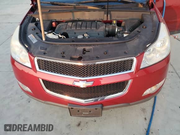 2012 Chevrolet Traverse 1LT с VIN 1GNKRGED1CJ423971, выставлен на аукционе Copart как лот 69132705 с пробегом 93 530 миль миль и Списание • Salvage title. История ставок и продаж доступна на DreamBid. Изображение 11.