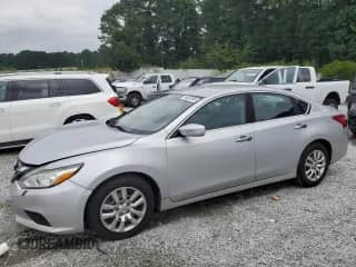 2016 Nissan Altima S with VIN 1N4AL3AP5GC229829, listed as a Copart auction lot 69560585 with 214,805 mi miles and Salvage title. Bid and sale history available at DreamBid. Image 1.