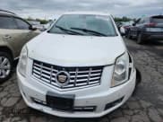 ✅ 2015 Cadillac SRX Performance Collection • VIN: 3GYFNFE31FS531821 • Lot: 68568995. Listed on Copart with 90,227 mi. Free auction sales archive from the USA and detailed vehicle history report at DreamBid. Image 5.