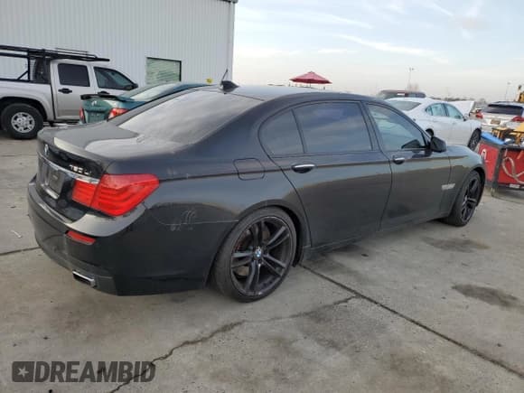✅ 2011 BMW 7 Series 750Li • VIN: WBAKB8C51BCY66264 • Lot: 85604624. Listed on Copart with 94,563 mi. Free auction sales archive from the USA and detailed vehicle history report at DreamBid. Image 3.
