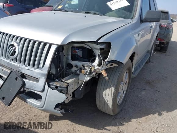 ✅ 2008 Mercury Mariner • VIN: 4M2CU81188KJ08352 • Lot: 41790253. Listed on IAAI with 133,189 mi. Free auction sales archive from the USA and detailed vehicle history report at DreamBid. Image 6.