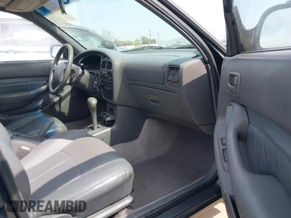 ✅ 1995 Toyota Camry LE • VIN: JT2SK12E1S0330730 • Lot: 42916715. Wystawiony na IAAI z przebiegiem 139 883 mil. Bezpłatny archiwum sprzedaży aukcyjnych z USA i szczegółowy raport historii pojazdu na DreamBid. Zdjęcie 5.