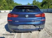 ✅ 2020 BMW X2 xDrive28i • VIN: WBXYJ1C01L5P43827 • Лот: 69745155. Опубликован ранее на Copart с пробегом 92 030 миль. Бесплатный доступ к архиву аукционных продаж из США и подробный отчёт об истории автомобиля на DreamBid. Изображение 6.