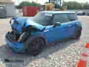 2007 MINI Hardtop S with VIN WMWMF73547TT84449, listed as a Copart auction lot 60490995 with 157,602 mi miles and Salvage title. Bid and sale history available at DreamBid. Image 1.