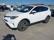 ✅ 2018 Toyota RAV4 XLE • VIN: JTMWFREV2JD132897 • Lot: 43310664. Listed on IAAI with 96,612 mi. Free auction sales archive from the USA and detailed vehicle history report at DreamBid. Image 2.